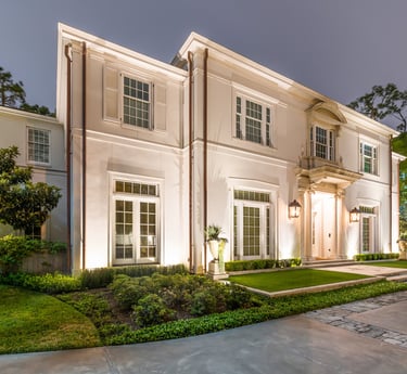 a large house with a driveway and a driveway