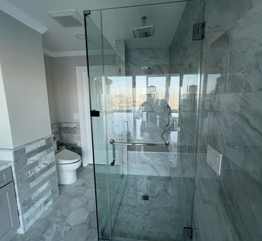 Completed bathroom remodel with waterproofing and tile work by Asha Construction