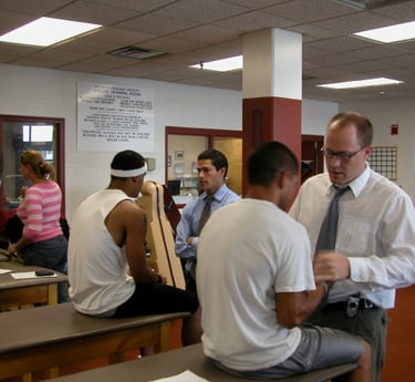 Fellows working at clinic with patients
