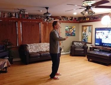 Johnny teaching Tai Chi for Health on Zoom from home.