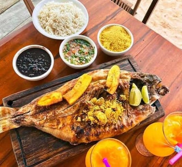 a fish - eating fish on a wooden table, Alter do Chão, Pará, Brazi