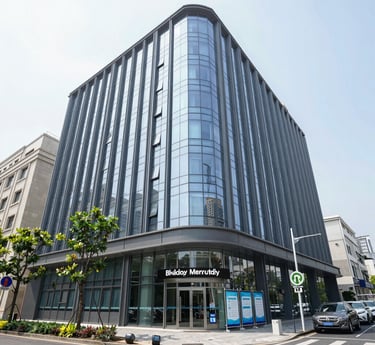 A large building facade with the Air Canada logo prominently displayed. The logo features a red maple leaf within a circle. The building is constructed from reflective materials and the scene is captured under a clear sky, suggesting a modern and corporate environment.
