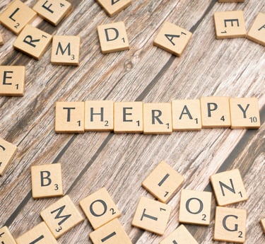 scrabbles of the word therapy