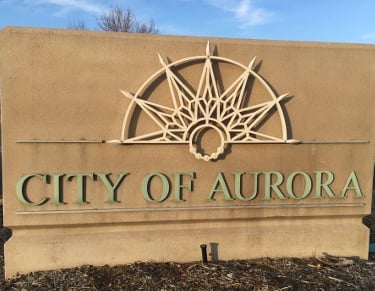 city of aurora sign