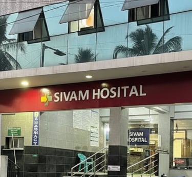 a hospital entrance with stairs and stairs leading to a hospital