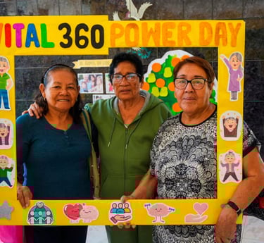 a woman in a blue shirt is holding a piece of paper