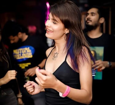 a woman with a tattoo on her chest and a tattoo on her chest