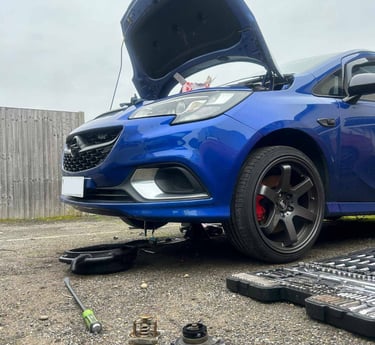 broken down car getting alternator replaced