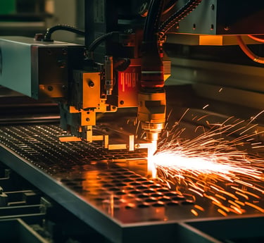 Industrial CNC laser cutting machine showcasing metal fabrication process