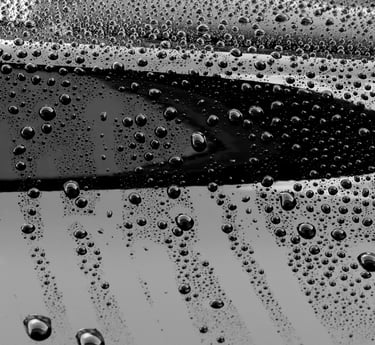 water droplets on a back car surface