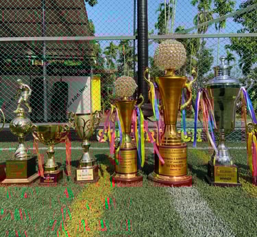 trophies in the football turf background in Ernakulam