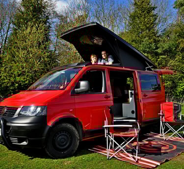 A VW T5 Transporter 4motion with pop top roof