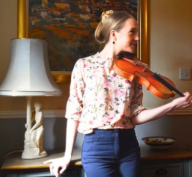 Charlotte Rowan, violinist in her teaching studio