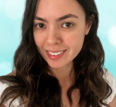 a woman with long hair and a white dress