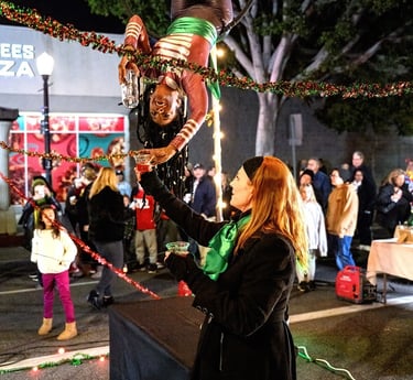Onyx Black pouring specialty elixirs for Aerialogists & Amber Nelson assists - Photo by Jim Sabo