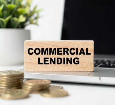 white and red wooden house miniature on brown table