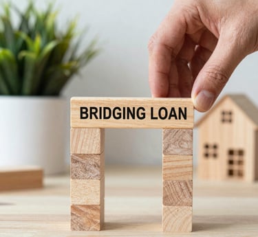 white and red wooden house miniature on brown table