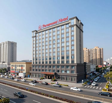 A sleek architectural rendering of a new hotel rising amidst a vibrant cityscape at sunset.