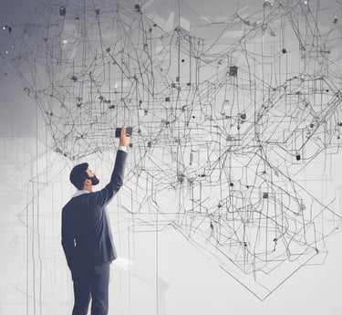 Professional team collaborating around a laptop in a modern office setting.