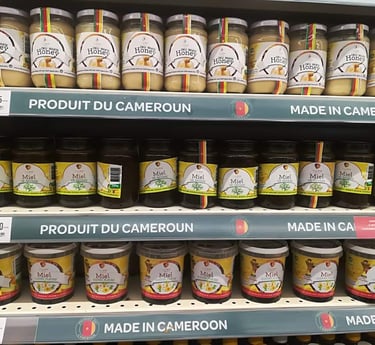 a display of jars of food and condiments on display in a store