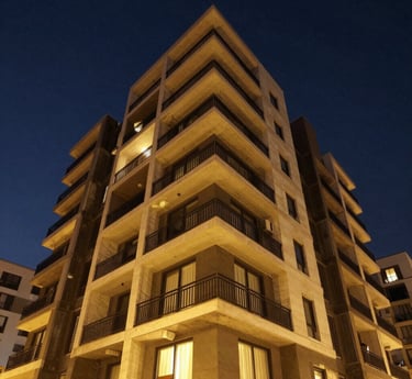 A sleek, modern luxury building framed by a powerful rhinoceros sculpture symbolizing strength and endurance.