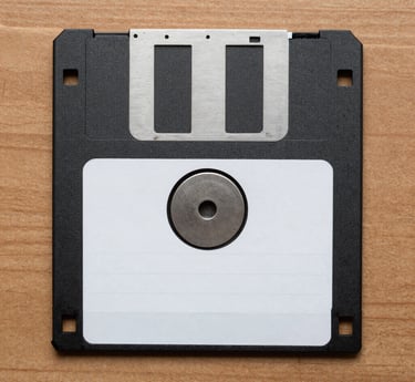 A team of focused professionals collaborating over laptops in a bright, modern office space.