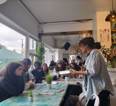 At the Portobello Shack, a woman giving talk about Notting Hill Carnival