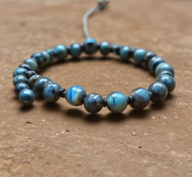 Close-up of a labradorite stone showing its shimmering blue and green flashes.