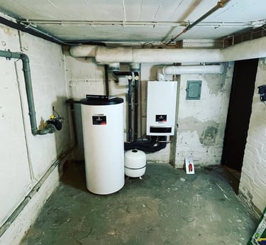 a tankless water heater in a basement
