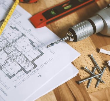 a drillet with screw screws and screws on a table