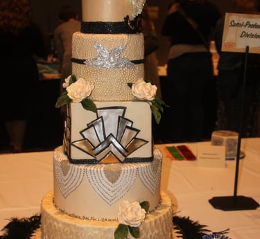 a cake with a white and black design on it