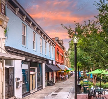 Store fronts in part of Athens, GA with a beautiful sunset in the back ground