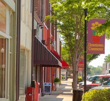 Image of Downtown Commerce, GA of a few of the stores in the historic buildings