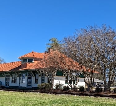 Beautiful photo of The Train Depot in lovely Downtown Lavonia. The trees are blooming.