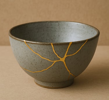 Kintsugi, a Japanese art of repairing broken pottery with gold symbolizing healing and resilience.