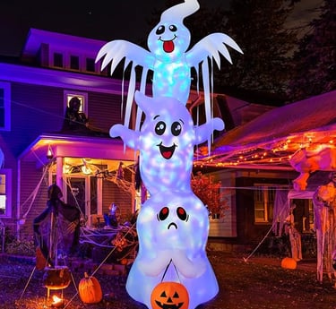 Large inflatable Halloween decoration featuring three stacked glowing ghosts with happy and spooky f