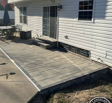 excellent landscaping and hardscaping of grass, stones and trees by NP Landscaping