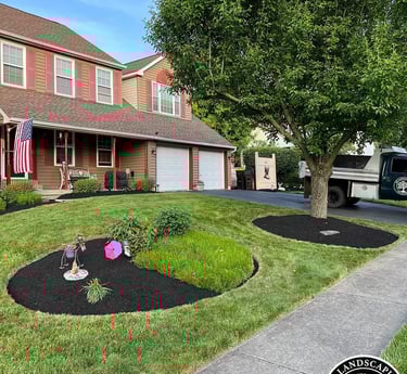 excellent landscaping and hardscaping of grass, stones and trees by NP Landscaping