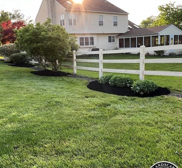 excellent landscaping and hardscaping of grass, stones and trees by NP Landscaping