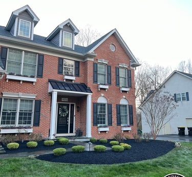 excellent landscaping and hardscaping of grass, stones and trees by NP Landscaping