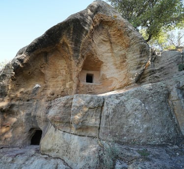 a cave in a cave with a cave in the background