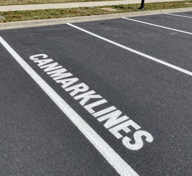 A clean and organized parking lot with freshly painted lines.
