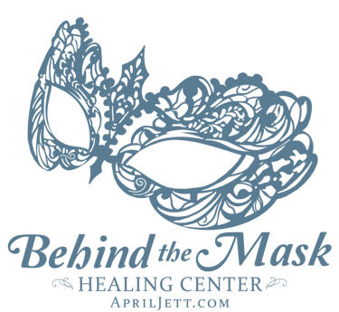 Behind the Mask Healing Center logo featuring an intricate blue filigree masquerade mask design.