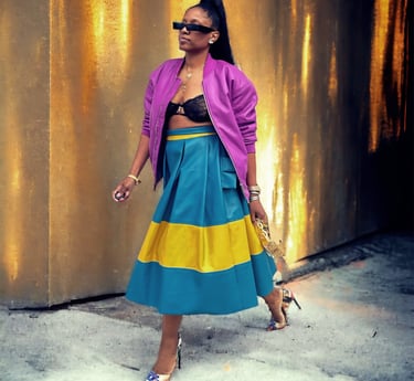 a woman in a colorful dress and heels