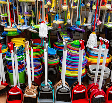 a bunch of brooms and brooms plastic cleaning tools and sets