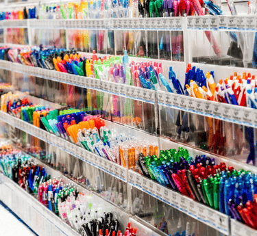a display case with lots of pens and pens