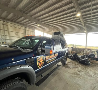 Titan Load truck unloading junk and trash from property cleanout in Tampa Florida