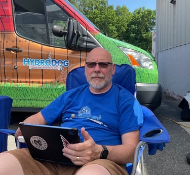 Jody relaxing in a quiet moment during a charity dog wash.