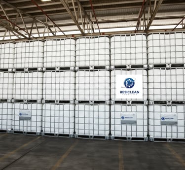 a large stack of white containers with a large amount of white containers