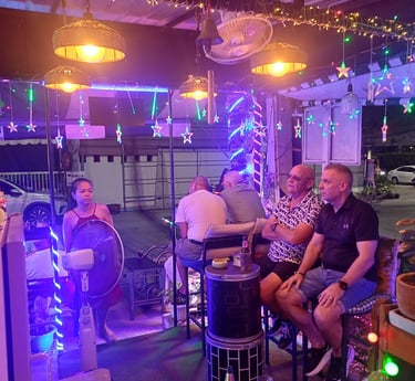 Customers watching TV at Anny Bar, Soi 94, Hua Hin